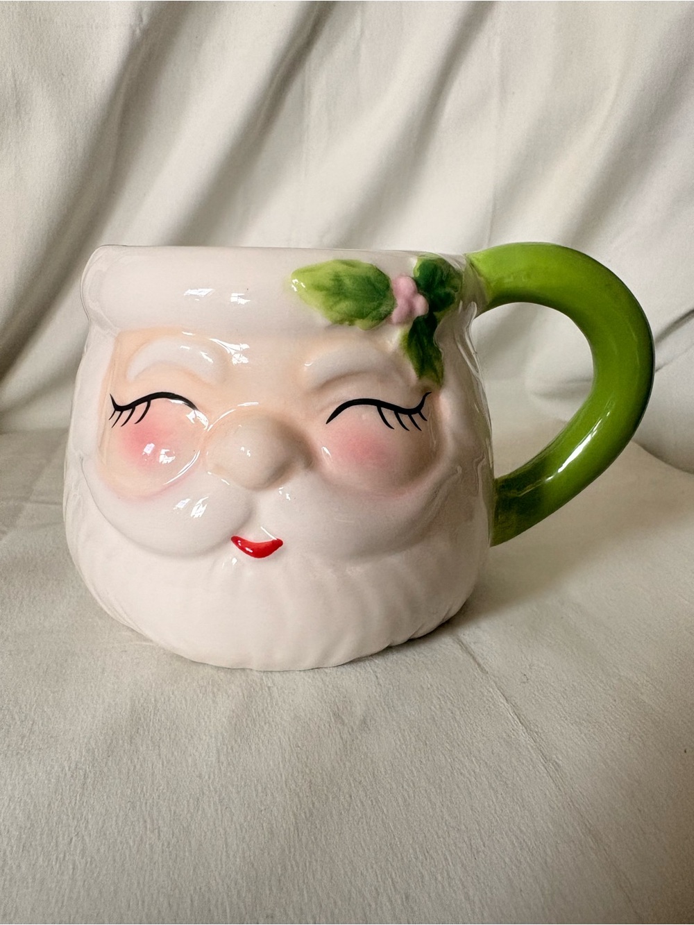 Whimsical Pink Ceramic Santa Face Mug with Green Handle